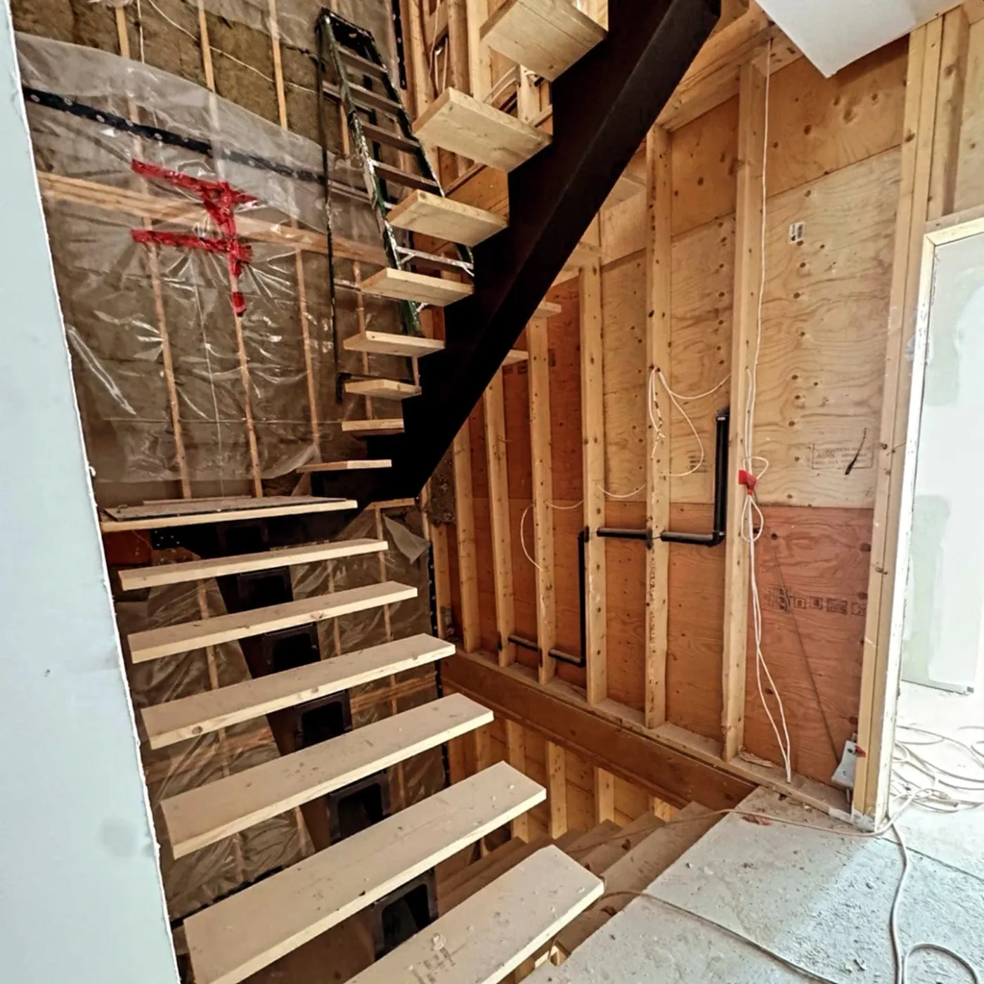 Structural wall reinforcement for floating stairs in Toronto